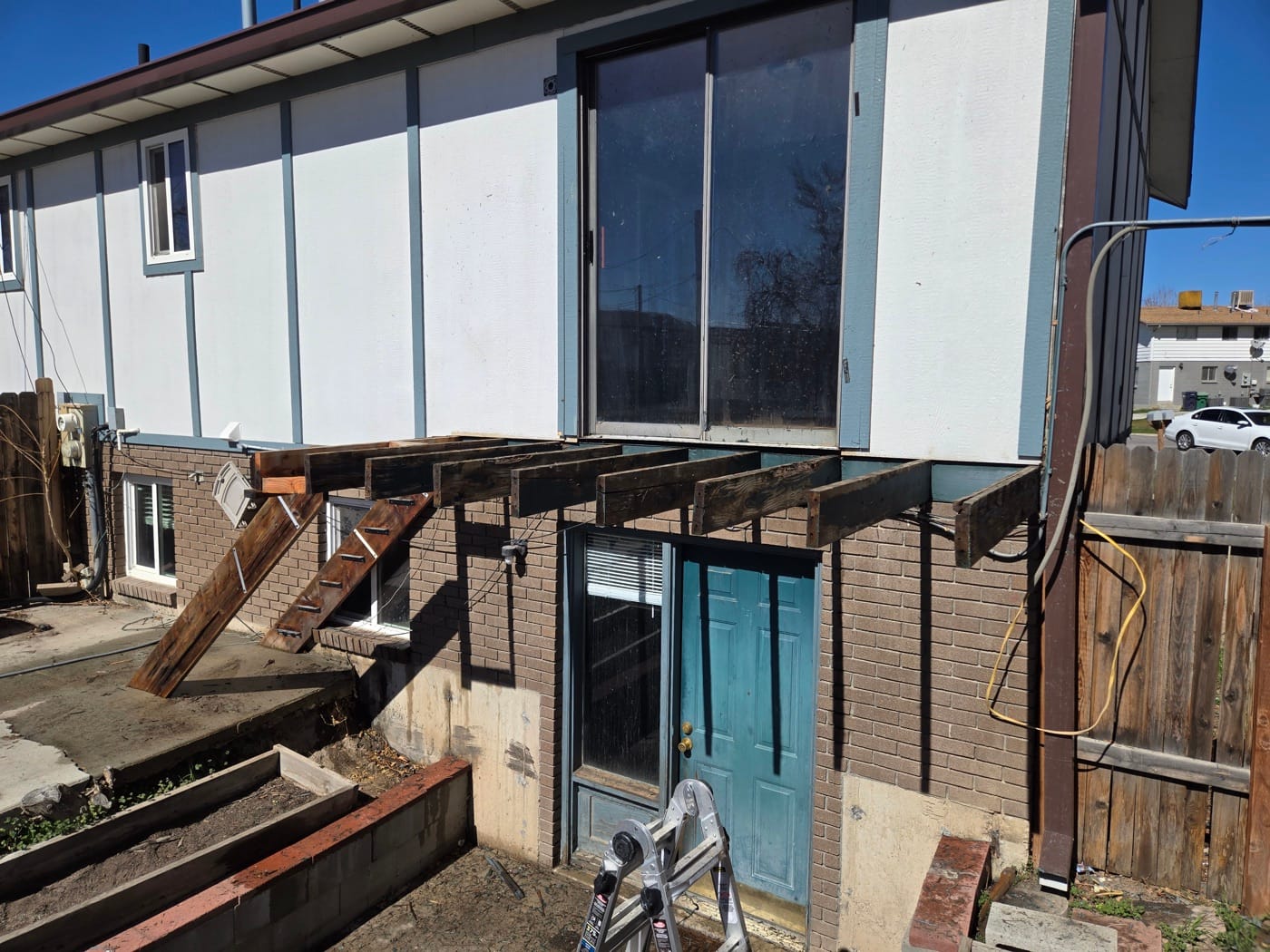 Custom deck build before — exposed framing at Carmen Court, deck construction in Sandy UT